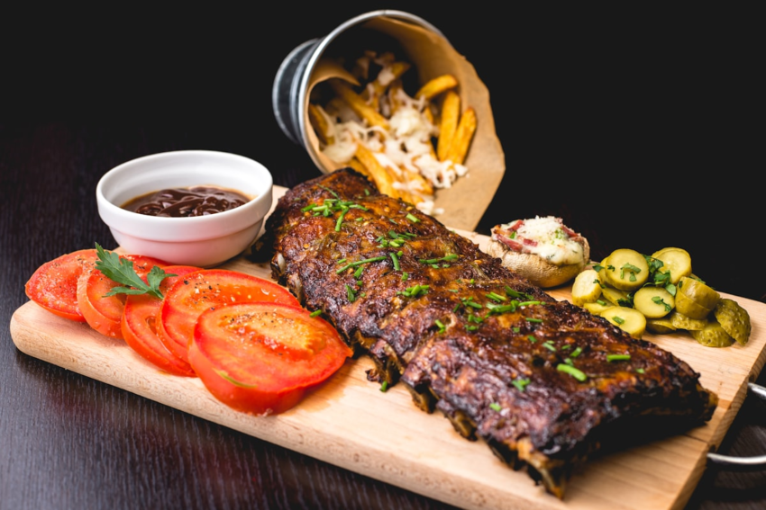 Raw beef steak on cutting board