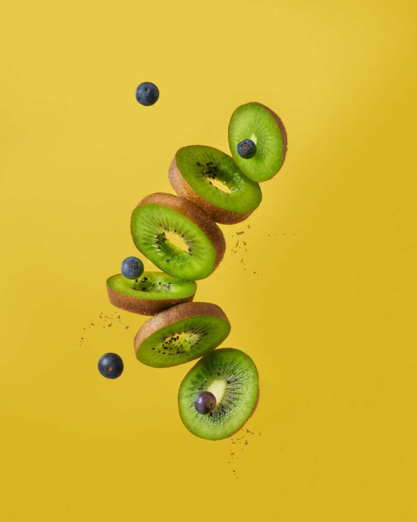 Green kiwifruit with leaves